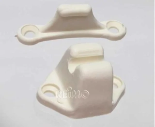 Držiak dverí béžovej farby